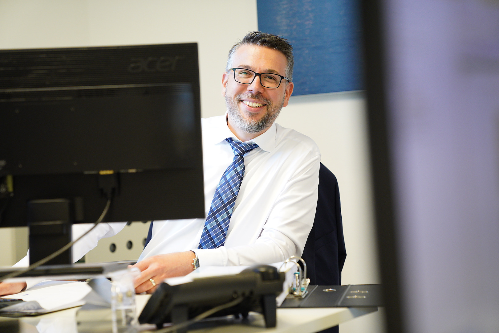 Ein Berater der Antax am Arbeitsplatz